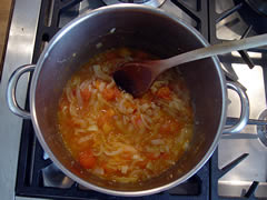 Cooking the onions and tomatoes