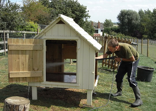 Washing a poultry house with Poultry Shield